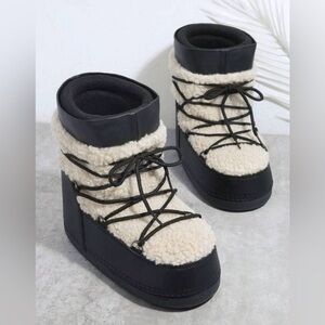 Women's Black and Cream Fuzzy Pull on Winter Boots Size 6